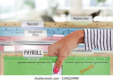 Employee Of Human Resources Department Introducing Confidential Payroll On Drawer
                              