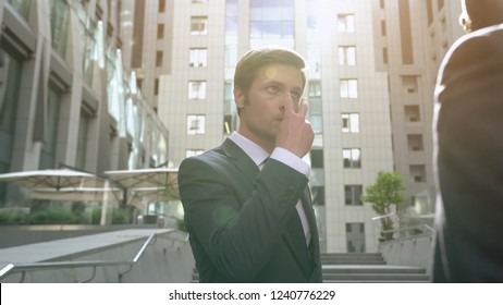 Employee Making Watching You Gesture To Colleague, Struggle For Workplace