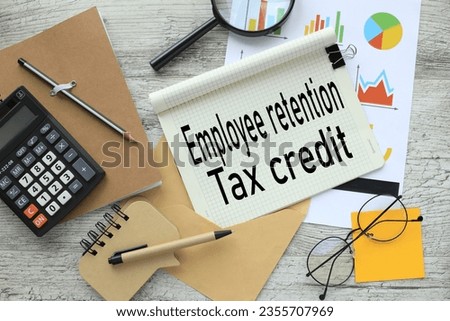 Employee retention tax credit. text on page on notepad. stationery