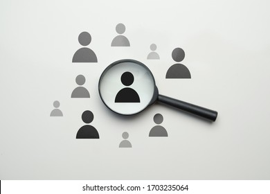 Employee Search HR Concept - Magnifier With Abstract Employee On A White Background. Close Up.