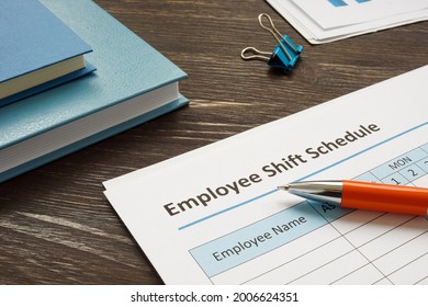 Employee shift schedule for work and pen.