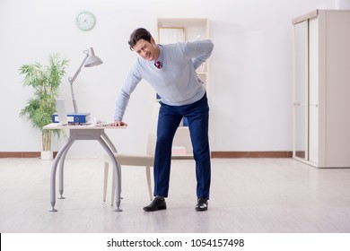 Employee Suffering From Backpain In Office