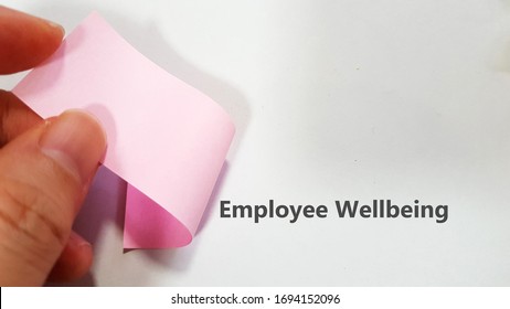 Employee Wellbeing Concept Using Fingers Flipping A Sticky Pad