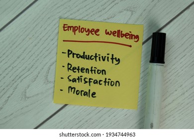 Employee Wellbeing Write On Sticky Notes Isolated On Wooden Table.