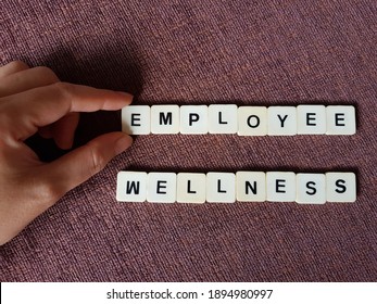 Employee Wellness Concept Using Alphabet Tiles