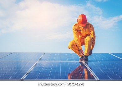 employee working on  maintenance equipment at industry solar power: working on Wrench tightening solar mounting structure of photovoltaic panel  - Shutterstock ID 507141298
