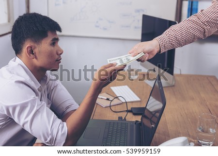Employees accepting bribes while working. Venality, bribe, corruption concept