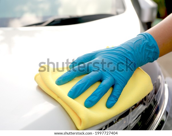 Employees are\
cleaning cloths at the car wash\
shop
