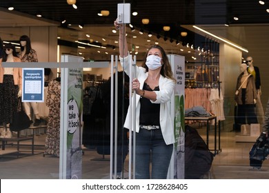 Employees Of A Clothing Store Make The Final Adjustments Before Its Reopening, On May 11, 2020 In Brussels, Belgium.