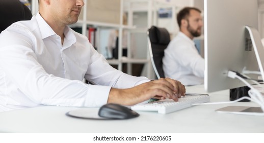 Employees Of The Company At Work In The Office. Workplace And Everyday Moments And Responsibilities. Phone Calls, Customer Interaction And Computer Work