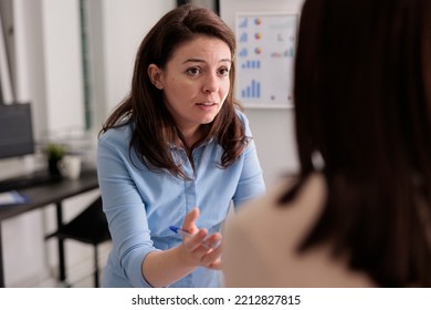 Employees Discussion, Woman Explaining Management Strategy On Corporate Meeting, Colleagues In Coworking Space. Project Manager Talking About Business Plan, Standing In Office