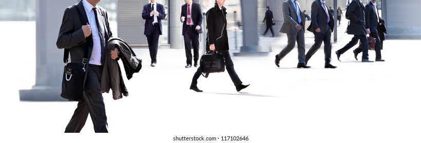 Employees going against the office. Panorama. A group of businessmen. - Shutterstock ID 117102646