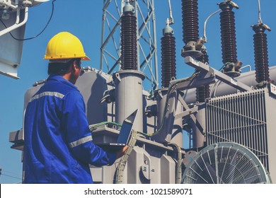 Employees Are Monitoring The Operation Of Large Transformers.