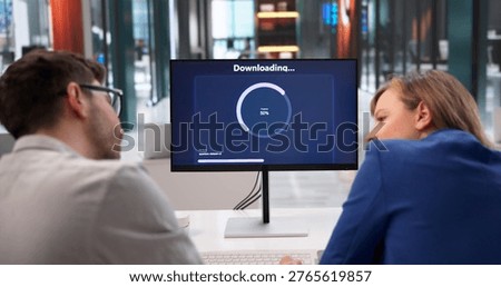 Employees Passing Time While Waiting For File Transfer Completion At Work