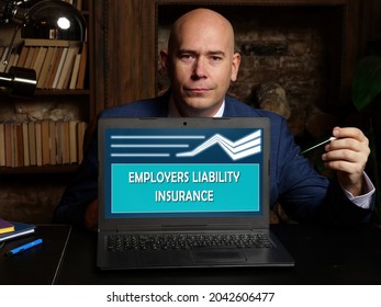  EMPLOYERS LIABILITY INSURANCE Text In Search Line. Budget Analyst Looking For Something At Computer. EMPLOYERS LIABILITY INSURANCE Concept. 

