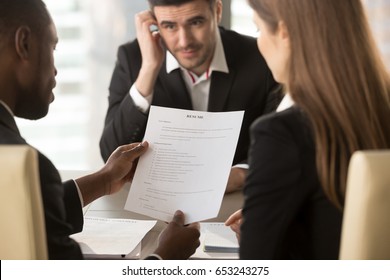 Employers Or Recruiters Holding Reviewing Bad Poor Cv Of Unemployed Worried Nervous Applicant Waiting For Result, Employment And Recruitment Concept, Rejected Job Application, Failed Interview