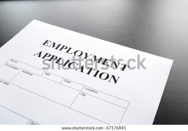 Employment Application Form On Desk Showing Stock Image Download Now