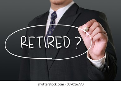 Employment concept, image of a businessman holding marker and write Retired words - Powered by Shutterstock