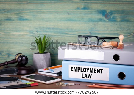 employment law concept. Binders on desk in the office. Business background