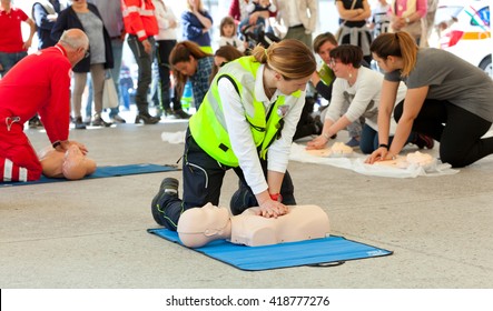 Empoli, Italy - 07 May 2016: The event is run in the square, doctors, nurses and volunteers welcome high school students for a course of first aid, also emergency vehicles on show.