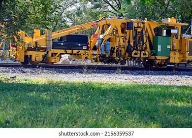 EMPORIA, KANSAS - October 7, 2021
Railroad Track Maintenance Is Performed By Burlington Northern Santa Fe Repair Crew Using A Ballast Tamper To Make The Tracks And Roadbed More Durable And Level.  
