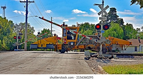 EMPORIA, KANSAS - October 7, 2021
Railroad Track Maintenance Is Performed By Burlington Northern Santa Fe Repair Crew Using A Ballast Tamper To Make The Tracks And Roadbed More Durable And Level.  
