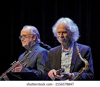 EMPORIA, KANSAS, USA - OCTOBER 9. 2021
Saxophonist Blue Lou Marini (of The Blues Brothers Movie ) In A Duet With Trumpeter Art Davis During A Jazz  Concert In The Historic Emporia Granada Theatre