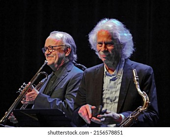 EMPORIA, KANSAS, USA - OCTOBER 9. 2021
Saxophonist Blue Lou Marini (of The Blues Brothers Movie ) In A Duet With Trumpeter Art Davis During A Jazz  Concert In The Historic Emporia Granada Theatre