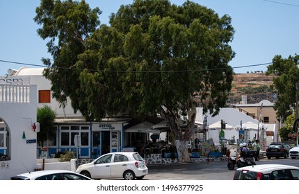 Emporio, Greece - July 14 2019:   Cafes And Convenience Stores Clustered Around The Busy Town Square