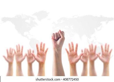 Empowering women power, human rights and labor day concept with strong fist hands on world map
