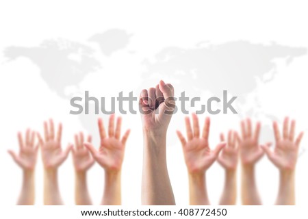 Empowering women power, human rights and labor day concept with strong fist hands on world map