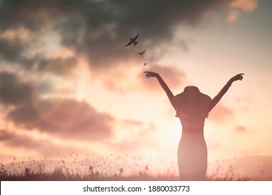 Empowerment wise female with hands rise up on beautiful view. Christian praise on hill thanksgiving day background. women standing open arms love sun concept ambitious fun wisdom woman day.