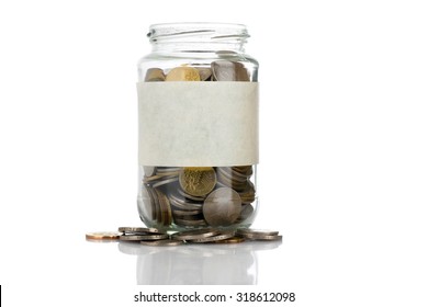 An empt text label on full coins of jar spill out from it isolated on white background - saving, donation, financial, future investment and insurance concept