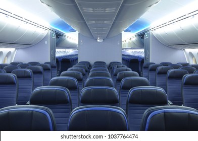 Empty 787 commercial airplane cabin interior with blue leather seats