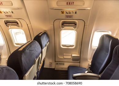 Empty Aircraft Seats Close To Emergency Door Exit