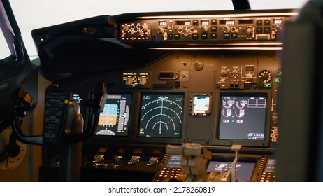 Empty Airplane Cockpit With Dashboard Command To Throttle Engine, Navigation Windscreen To Fly Aircraft. Cabin With Control Panel And Power Switch, Radar Compass Lever. Close Up.