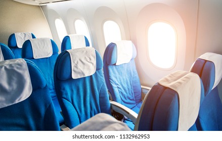 Empty Airplane Seats In The Cabin Economy Class.