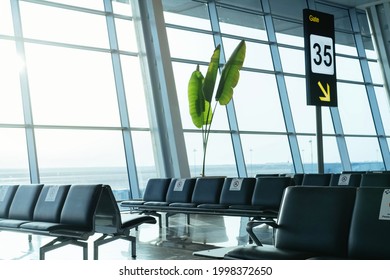 Empty Airport Departure Area. No People In The Lounge Or Terminal. View At The Gates