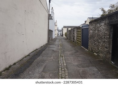 empty alley on a clear day - Powered by Shutterstock