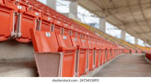 Empty arena seats with numbers in a stadium on sport game festival - Powered by Shutterstock