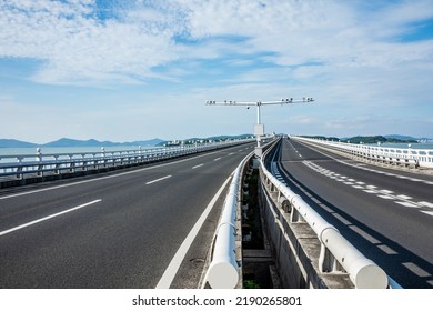 Empty Asphalt Highway Scenery By The Sea