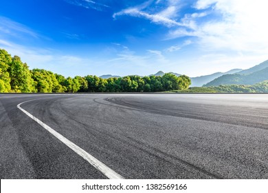 Empty Asphalt Race Track And Beautiful Natural Landscape