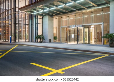 empty asphalt road along modern business buildings in city of China. - Shutterstock ID 585523442