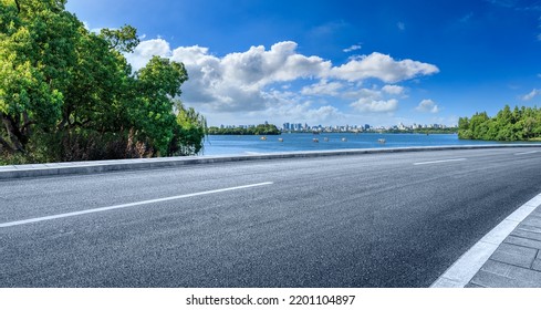 Empty asphalt road and city skyline with modern buildings scenery in Hangzhou, China. - Shutterstock ID 2201104897