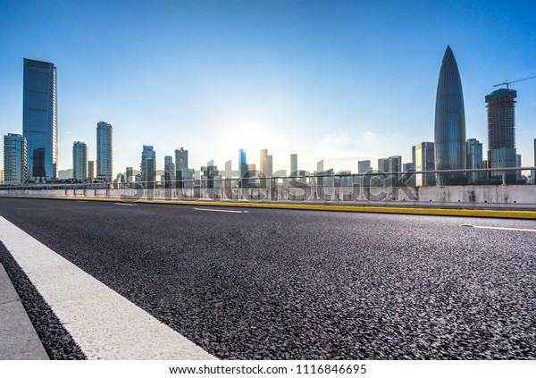 empty\
asphalt road with city skyline in shenzhen\
china