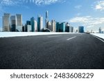 Empty asphalt road and cityscape in modern city