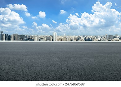 Empty asphalt road and cityscape in modern city