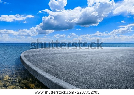 Empty asphalt road platform by the sea