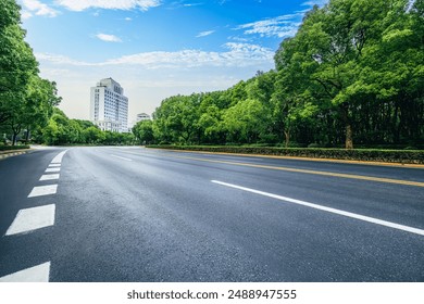 Empty asphalt road and trees background - Powered by Shutterstock