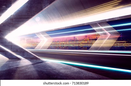 Empty Asphalt Road Tunnel During The Night With Light Trails And Beautiful City Skyline Background .